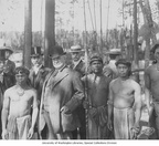 Governor James Smith%2C General Ira Nadeau and other AYPE officials posing with Igorrote villagers and their chief%2C Igorrote %28AYP 1182%29